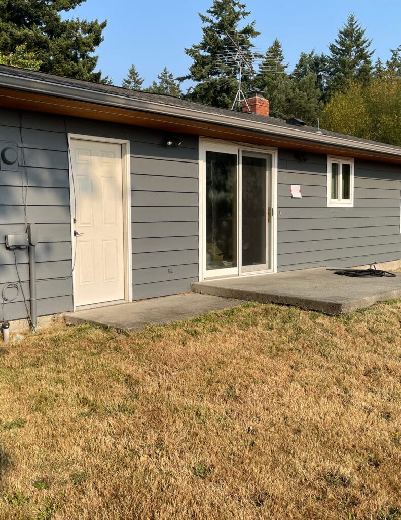 Benjamin Moore Gunmetal, dark shade of gray paint color for exterior siding in full afternoon west facing sun