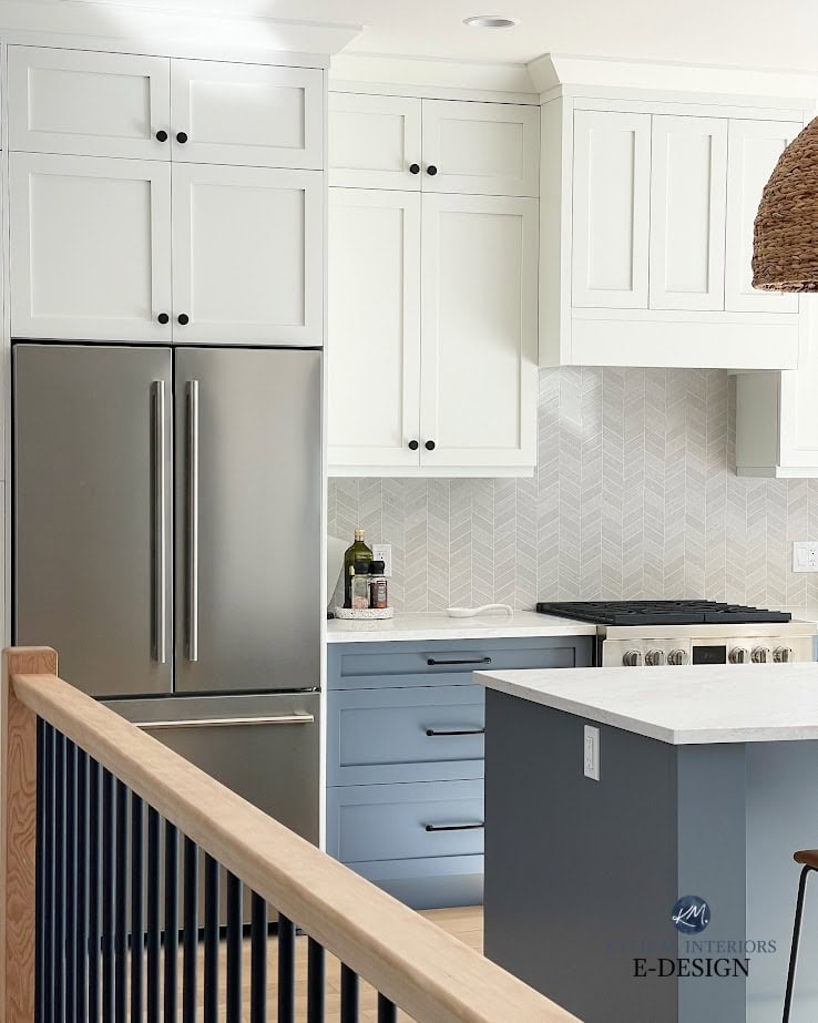 Benjamin Moore best medium blue gray paint color, Britannia Blue. White upper cabinets, blue lower cabinets and painted kitchen island, chevron tile backsplash ,white oak, offwhite quartz. Kylie M