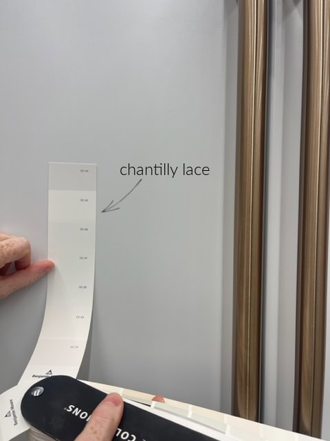 Benjamin Moore chantilly Lace with GE Cafe white appliances and bronze handles. Goes with it but doesn't match