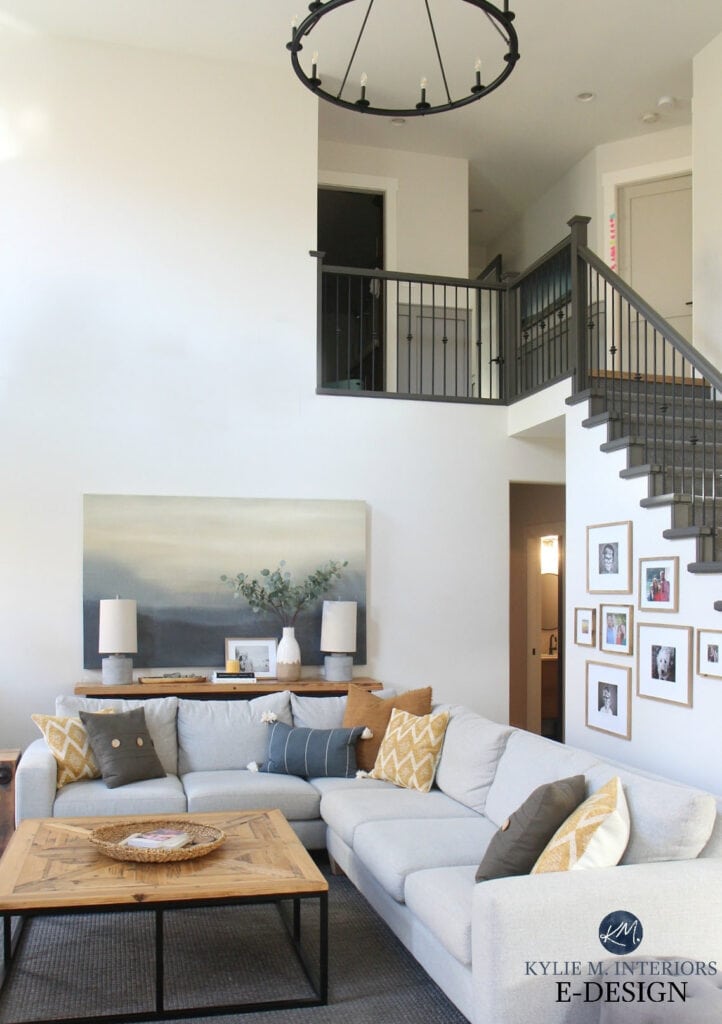 LIVING ROOM WITH TALL VAULTED CEILING, MAKE IT LOOK LOWER OR COZIER, GRAY SECTIONAL SOFA, LARGE ARTWORK, KYLIE M