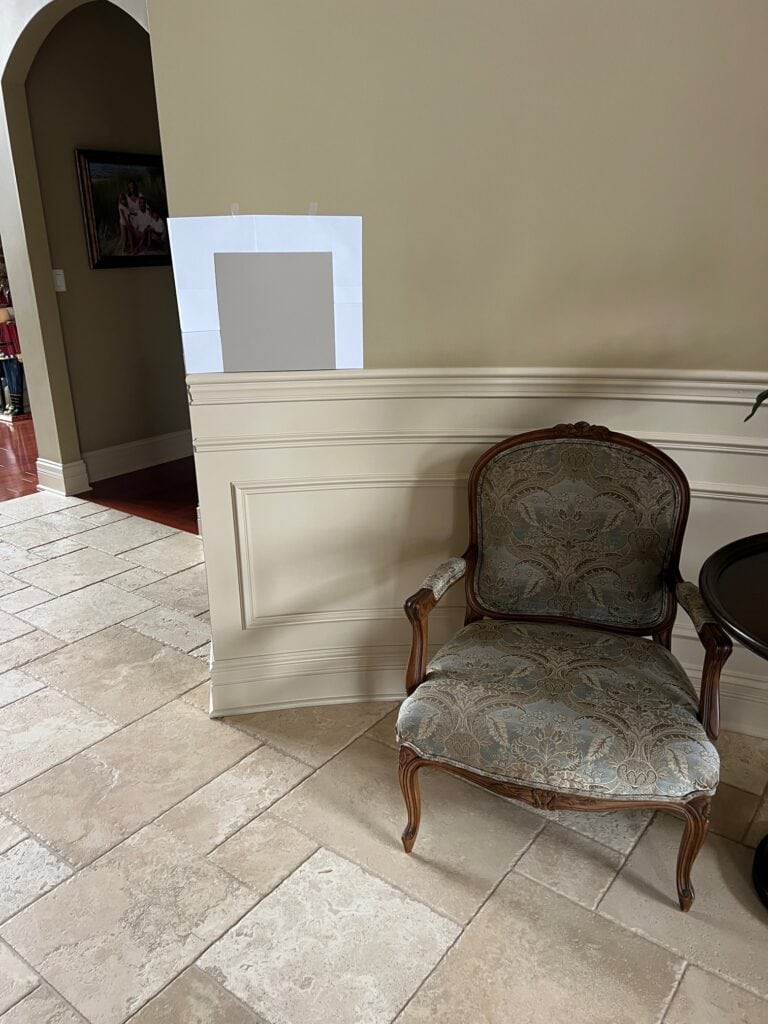 Travertine floor with Sherwin Williams Kilim Beige trim, cabinets or wainscoting. Taupe greige paint color for walls.
