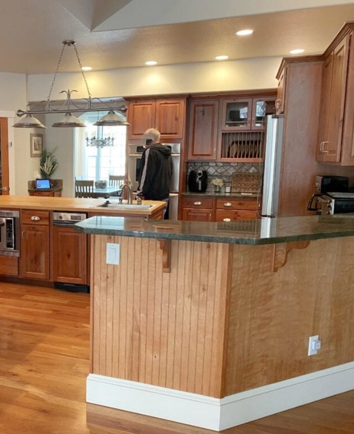 cherry wood kitchen cabinets before being painted alabaster adding floating shelves