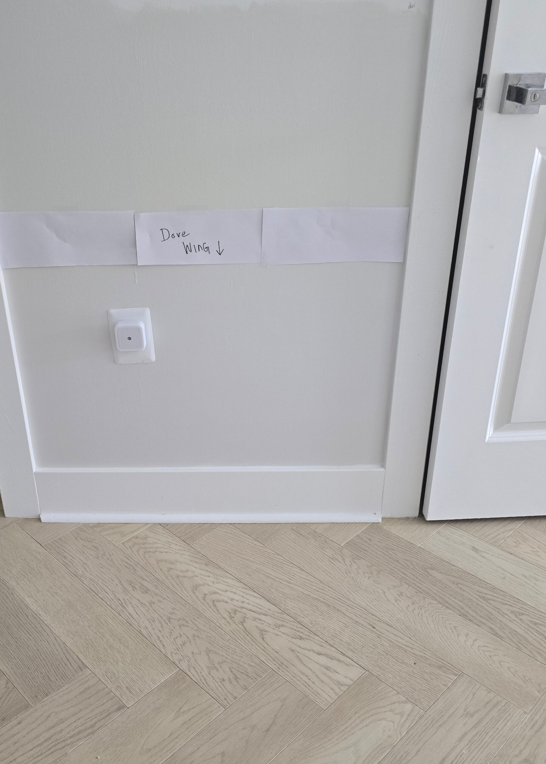 Benjamin Moore Dove Wing, BEhr Ultra Pure White trim, taupe pink cream herringbone wood floor with whitewash.