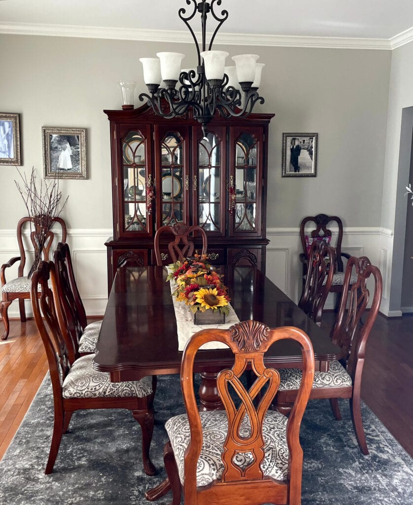Benjamin Moore Revere Pewter, dark red stained cherry wood furniture, oak floor, traditional style, Benjamin Moore Revere Pewter walls, White Dove trim and wainscoting