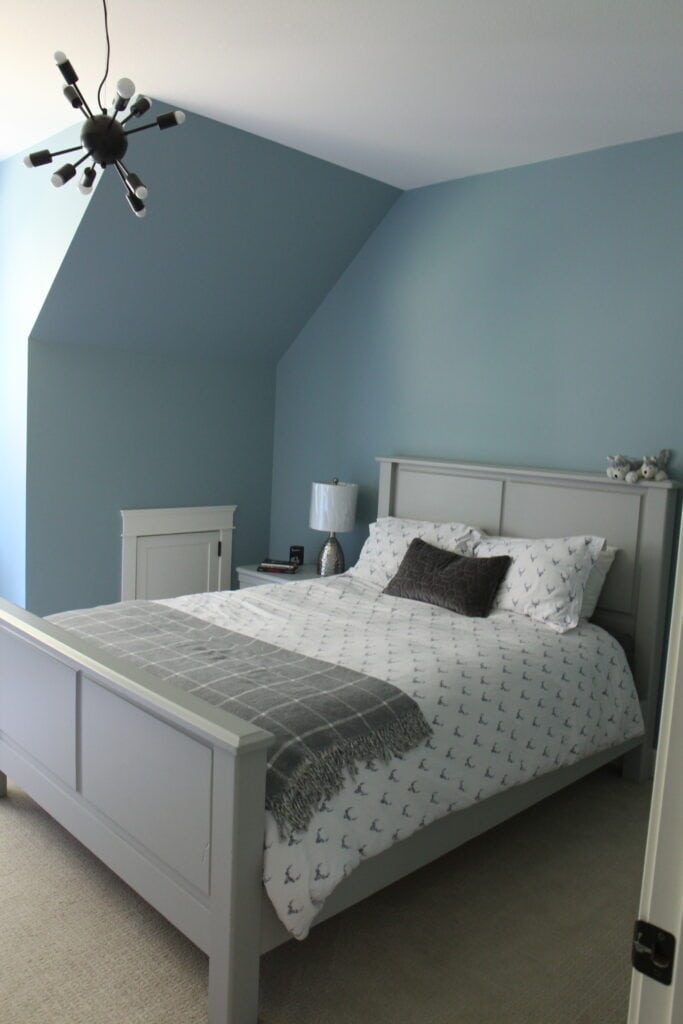 Boys bedroom paitned blue gray paint color, Benjamin Moore Colorado Gray, gray wood furniture, beige carpet