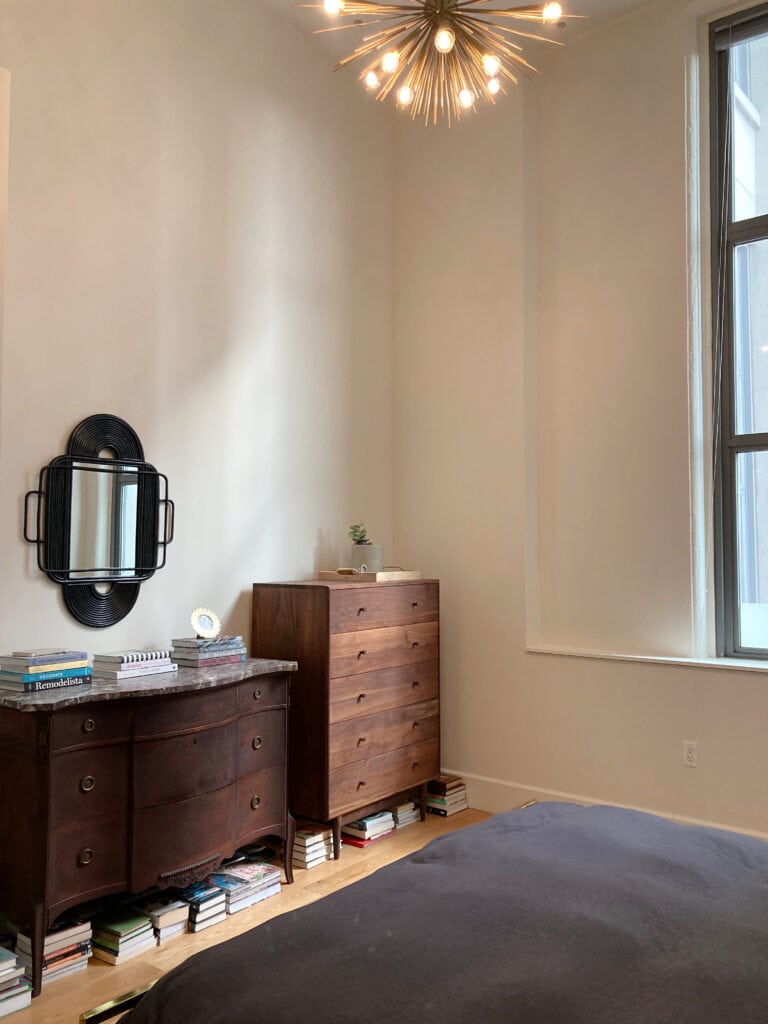 Benjamin Moore China White, Seapearl, warm off white paint color in loft style bedroom, high ceilings, trim the same color. south-facing exposure Kylie M
