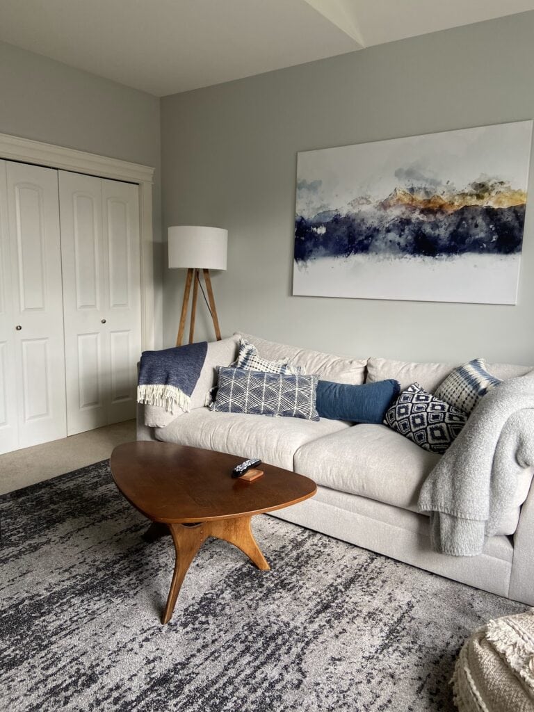 Benjamin Moore Gray Owl, Cloud White trim and closet doors, blue and neutral accents, sofa in den