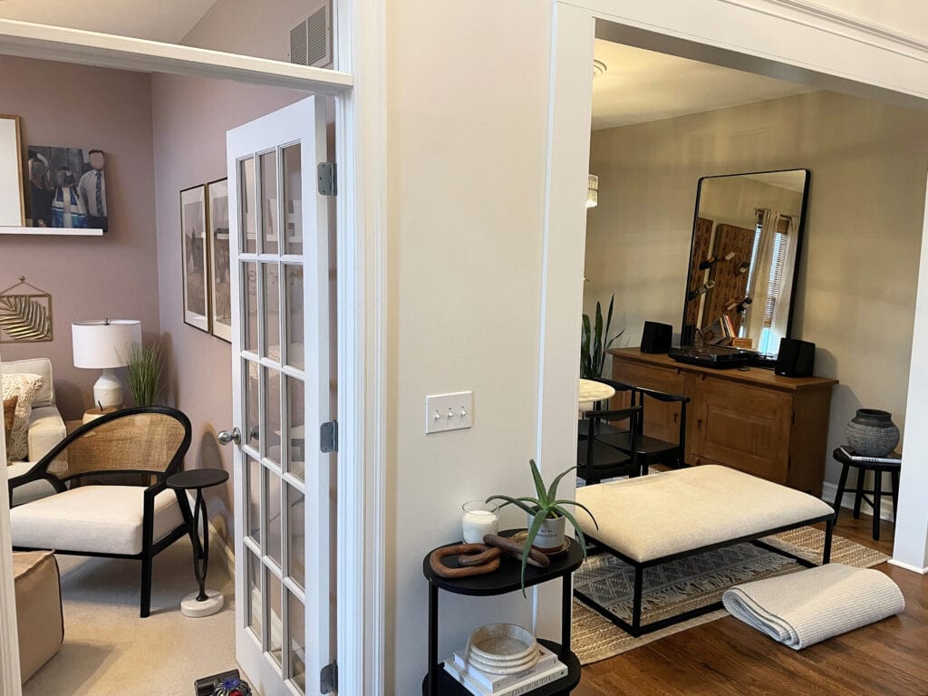 Color palette with den in Benjamin Moore Flax, Chamois hallway, White Dove trim, Revere Pewter dining area, dark wood oak floor