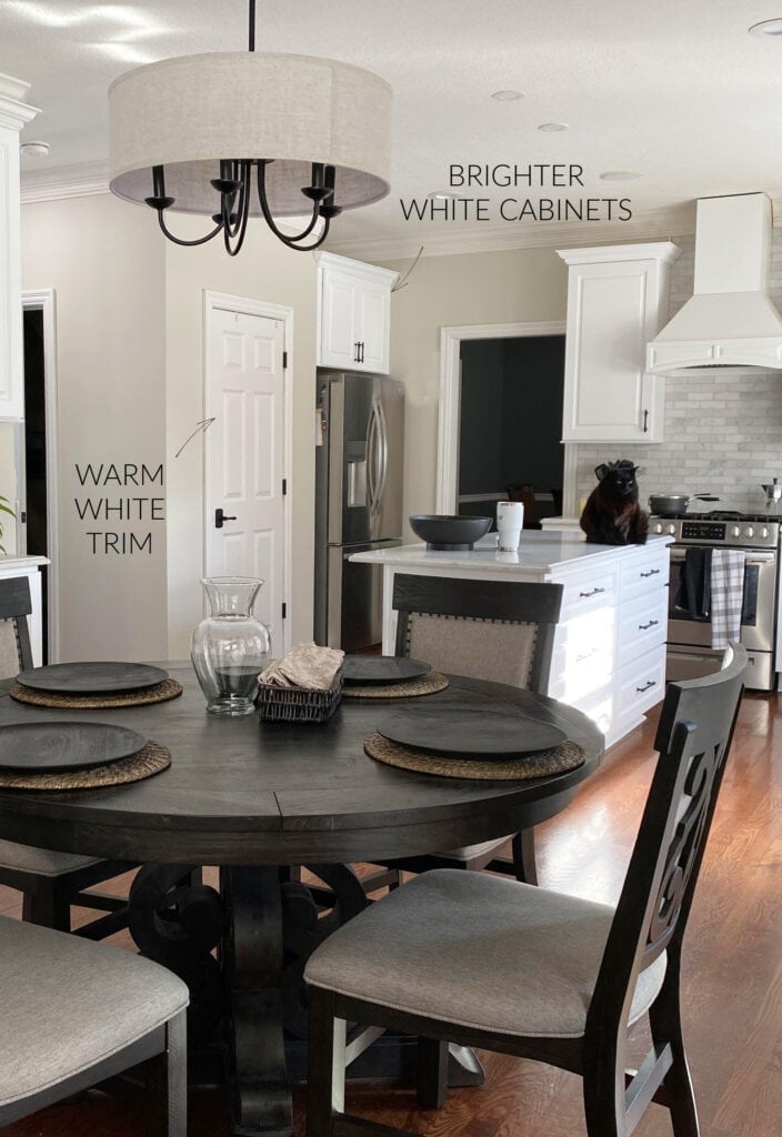 Benjamin Moore Natural Cream paint color on walls, bright white cabinets, warm white trim don't look good together