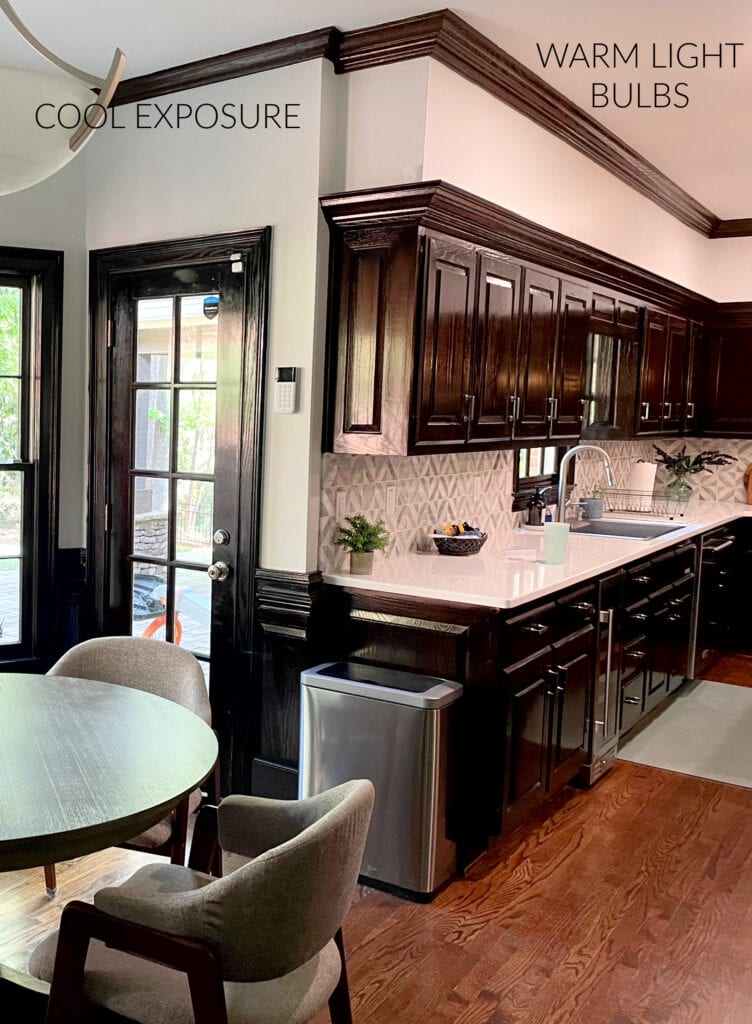 Benjamin Moore Paper White in different lights, dark wood trim, door, wainscoting, kitchen cabinets, dark stain, oak floor, white quartz