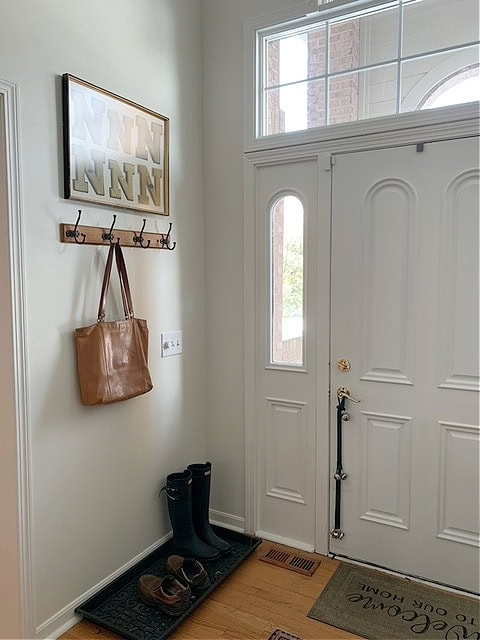 Benjamin Moore Soft Chamois, White Dove trim and front door, oak floor