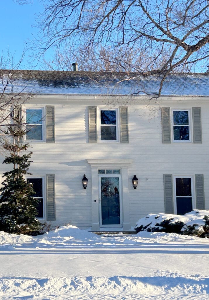 EXTERIOR SIDING PAINTED SHERWIN WILLIAMS WHITE DUCK, INTELLECTUAL GRAY GREIGE SHUTTERS, MOUNTAIN PASS DARK GREEN FRONT DOOR, WHITE WINDOWS. KYLIE M (1)