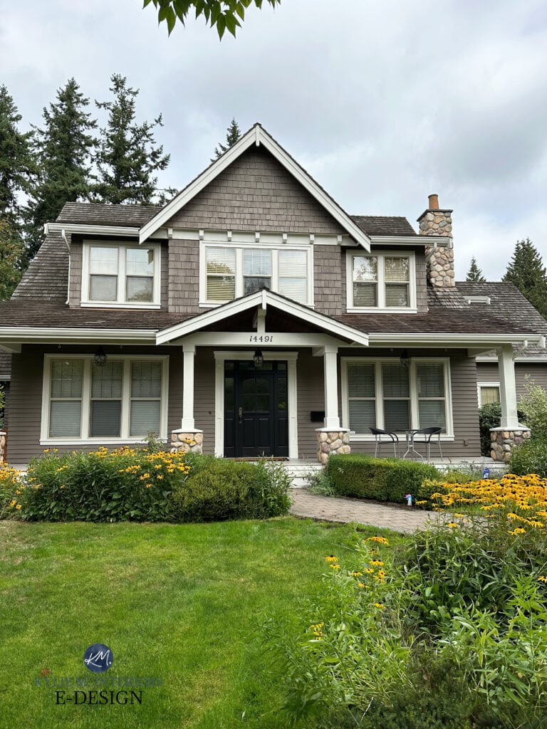 Gray out cedar shake roof, river rock stone pillars and fireplace, warm white trim, mid-tone greige taupe paint color on siding, almond, bone, beige tan windows