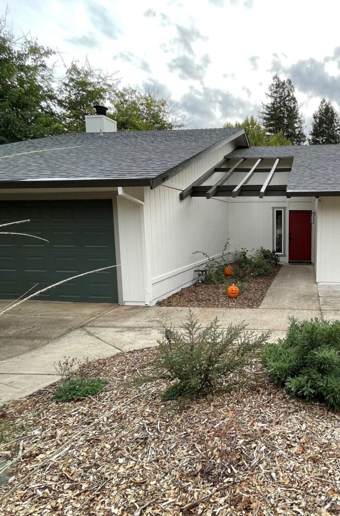 INTELLECTUAL GRAY exterior trim, Urbane Bronze fascia, Pewter Green garage door, Salute red front door, off white siding