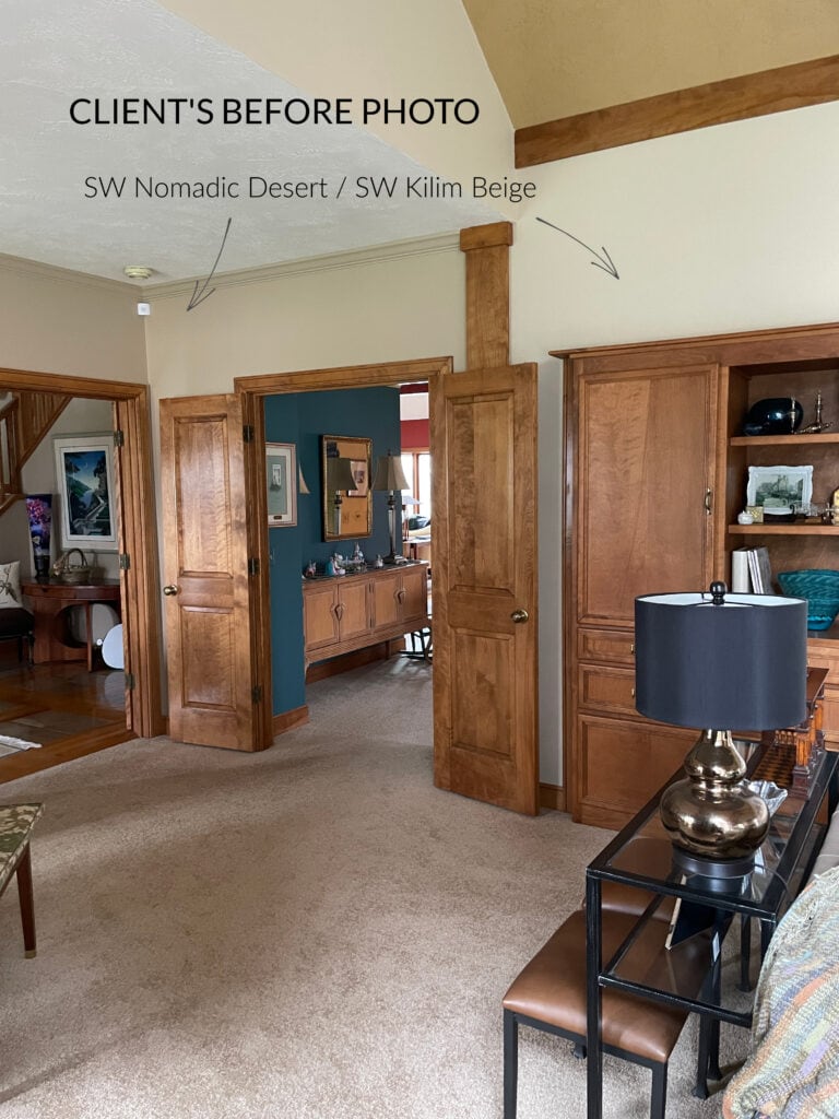 Sherwin Williams Kilim Beige and Nomadic Desert with wood trim and beige carpet, wood doors.