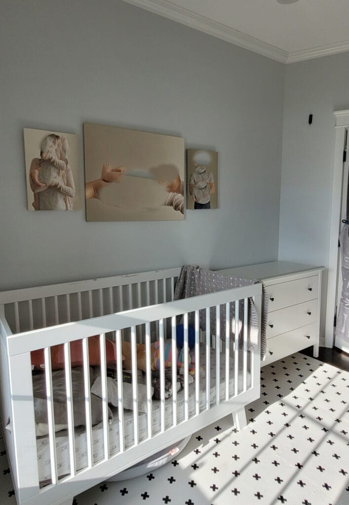 Sherwin Williams Rock Candy, cool gray neutral paint color, baby nursery, room with white cvrib, white and black cross click together foam floor