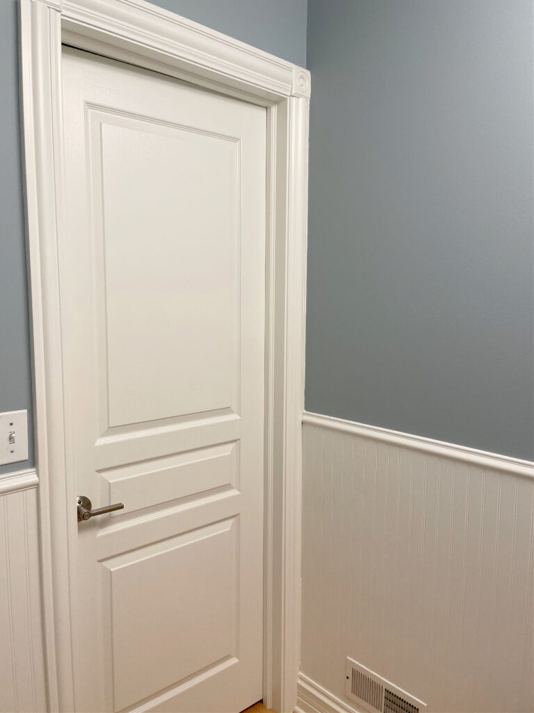 Sherwin Williams Stardew blue paint color with Benjamin Moore White Dove trim and door