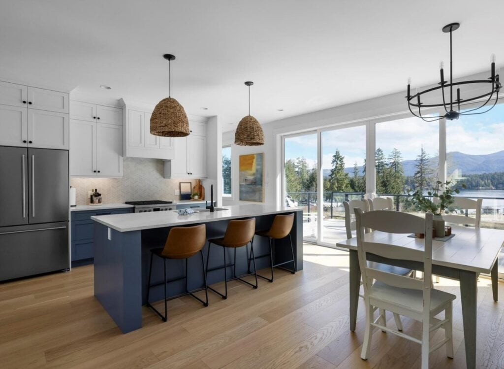 Benjamin Moore White Dove cabinets, walls, trims, Brittania Blue kitchen island, white quartz countertop, lake style home open concetp