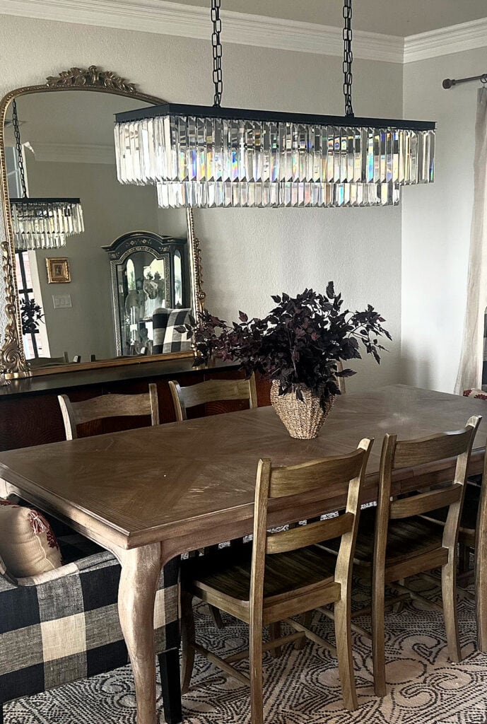 Sherwin Williams City Loft walls, Benjamin Moore chantilly Lace trim, modern farmhouse dining room, crystal chandelier, HOME DECOR ON WOOD DINING TABLE, UPHOLSTERED AND WOOD CHAIRS
