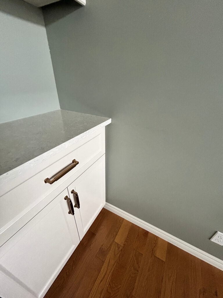 Benjamin Moore Gray Horse geen gray paint color, orange wood floor, Pale Oak painted cabinets