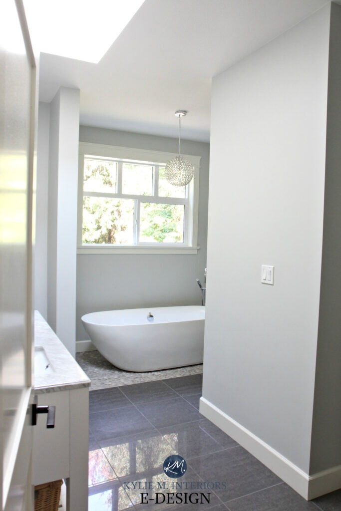Ensuite master bathroom. BEnjamin Moore Wickham Gray, freestanding tub, pebble tile floor. Kylie M Interiors Edesign and edecor, online paint color expert and blogger