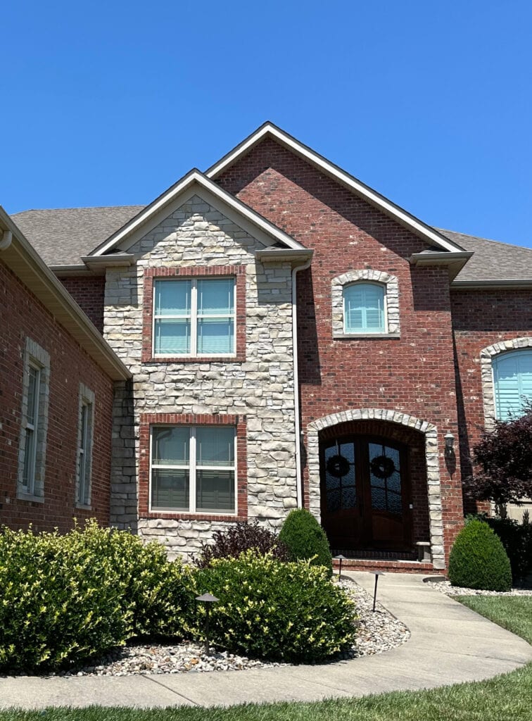 Exterior of home with red and purp