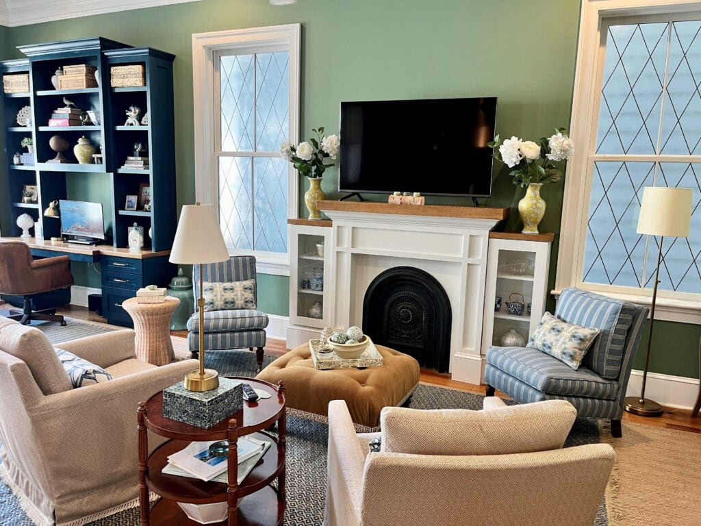 Family room, timeless and anti-trend colors Hague Blue painted cabinets, desk area, White Dove fireplace and trim, Calke Green paint color on walls, traditional style room and hoem decor, wood floor (1)