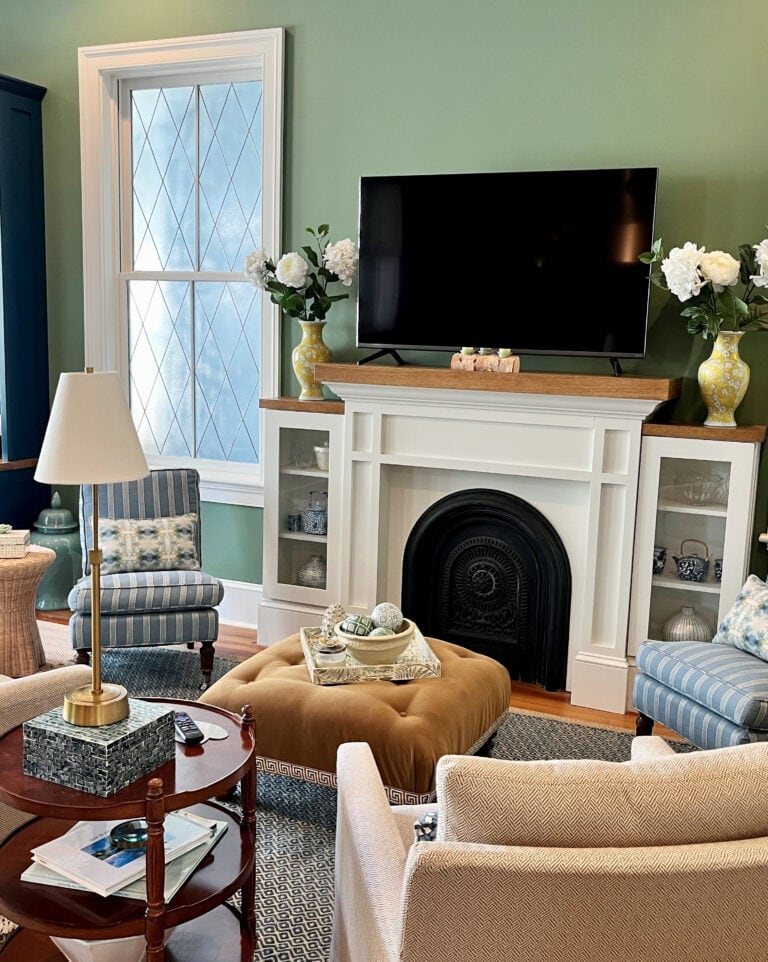 Family room, Hague Blue painted cabinets, desk area, White Dove fireplace and trim, Calke Green paint color on walls, traditional style room and hoem decor, wood floor