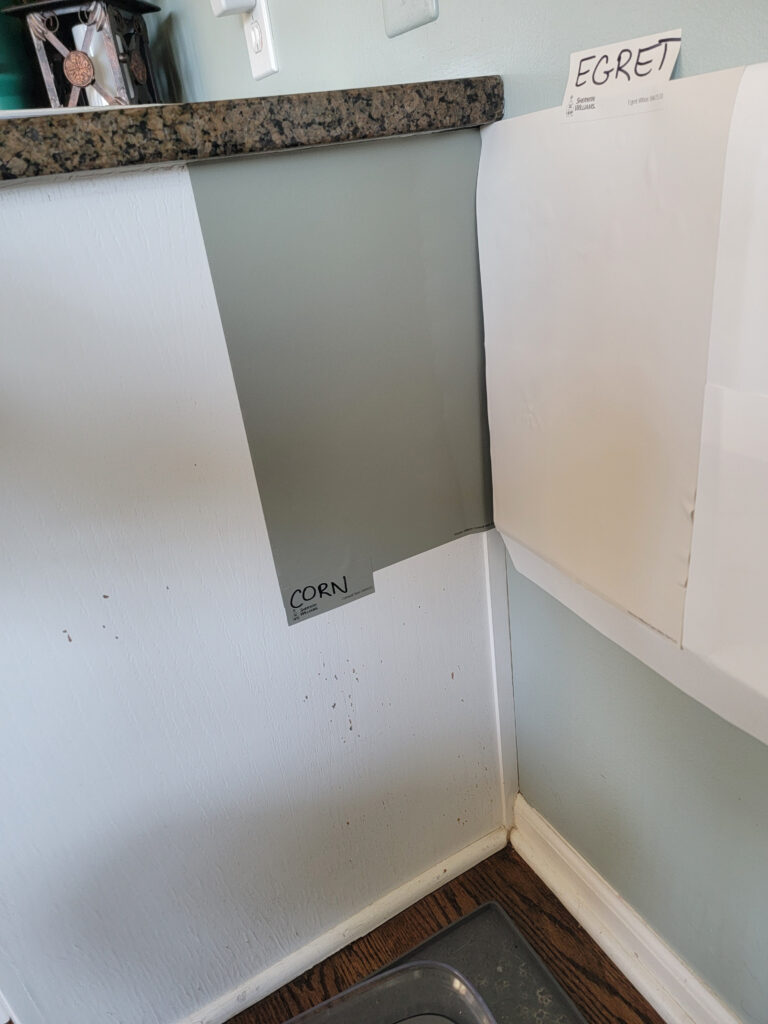 Granite countertop, Cornwall Slate green paint color for cabinets, Egret White for walls