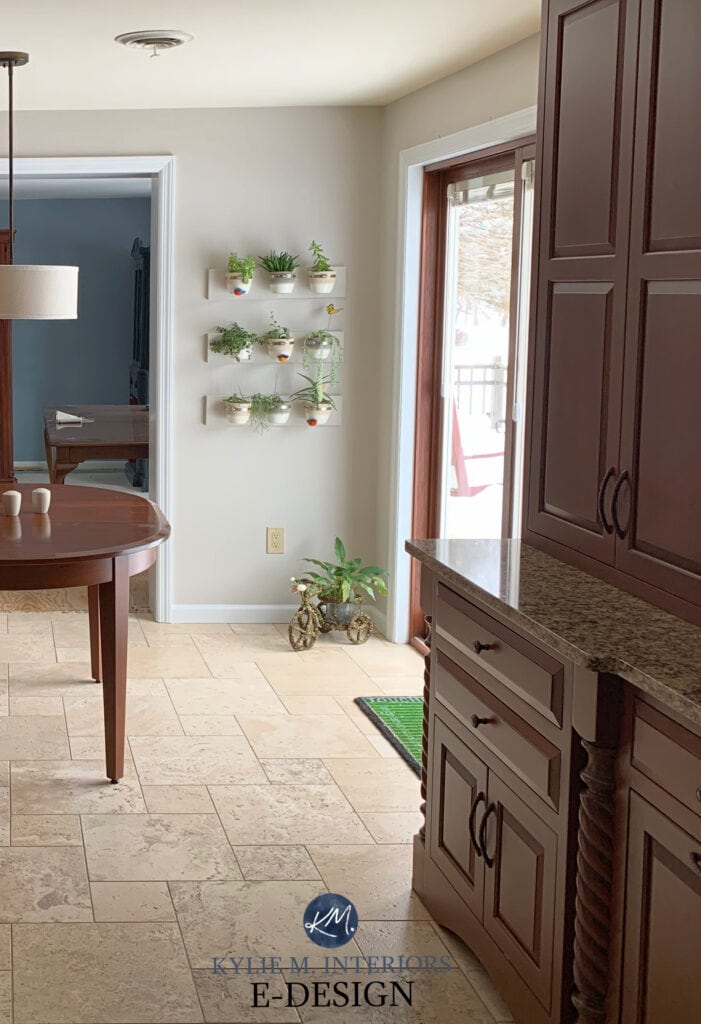 Kitchen with Travertine tile, floor, Benjamin Moore Collingwood gray walls, cherry red kitchen wood cabinets. Kylie M Interiors Edesign