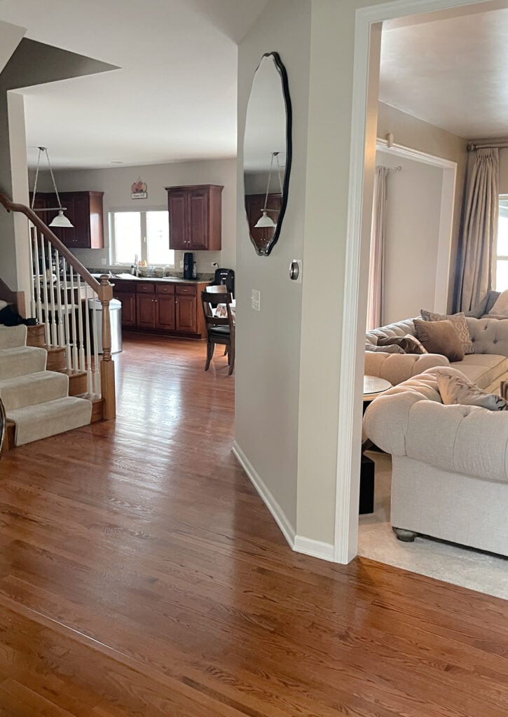 RED OAK FLOORING, RED STAIN MAPLE KITCHEN CABINETS, beige carpet on stairs, wood railing, Benjamin Moore Edgecomb Gray paint color on walls, client choice