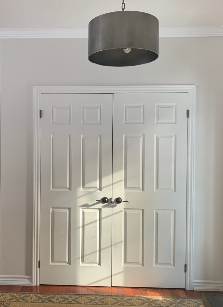 Sherwin Williams City Loft with white trim and wood floors (1)
