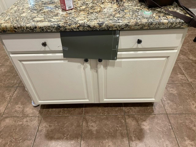 Sherwin Williams Ripe Olive, dark green paint color for kitchen island cabinet with beige tile floor and older style granite countertop with gold