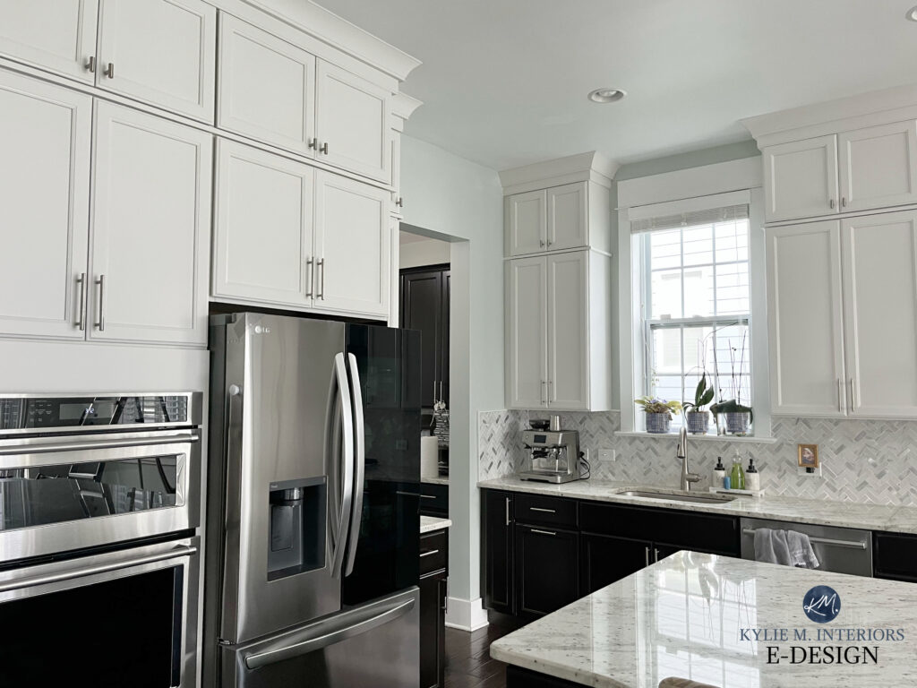 Sherwin Williams Sea Salt paint on walls, Drift of Mist warm grey greige on painted wood cabinets, granite countertop