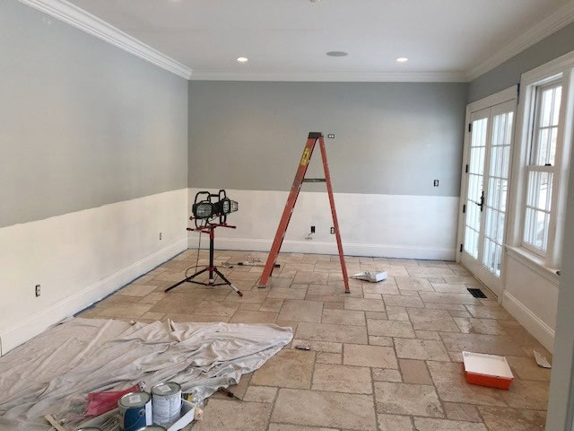 Benjamin Moore Stonington Gray and White Dove lower walls with travertine tile floors (beige).