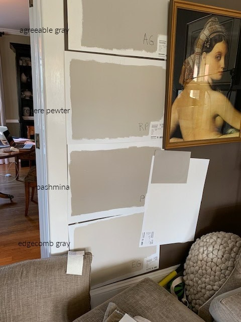 Sherwin Williams Agreeable Gray, Benjamin Moore Revere Pewter, Pashmina, Edgecomb Gray, samples against warm white trim