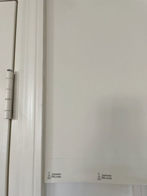 Sherwin Williams Antique White trim, cream cabinets with Samplize color