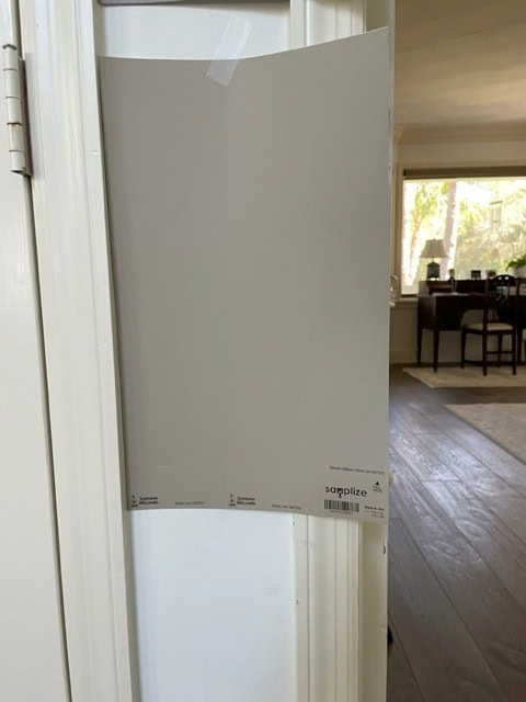 Sherwin Williams Stone Lion with Antique White trim or cream cabinets