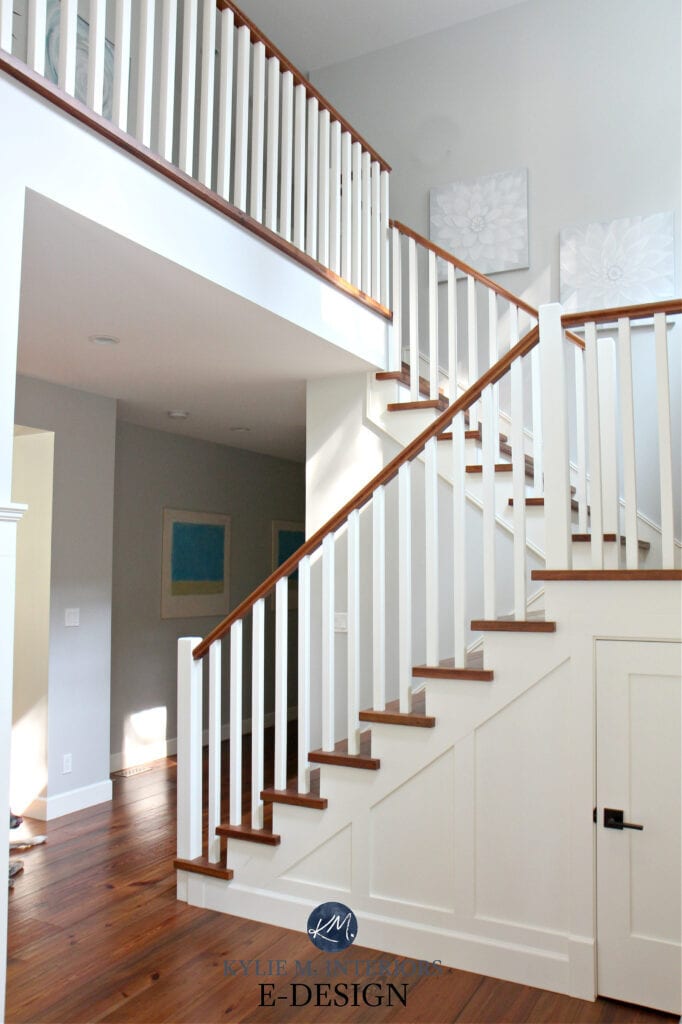 Staircase, white spindles, wood treads and stair raillings. Benjamin Moore Cloud White and Gray Owl. Kylie M Interiors paint color expert and blogger. Reclaimed pine wood flooring