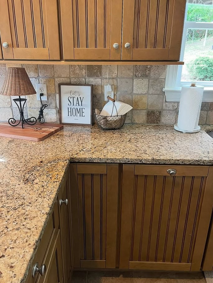 wood kitchen cabinets, maybe mable, beadboard inset, granite countertop a bit more gold than Santa Cecilia, travertine tile backsplash, kitchen update ideas