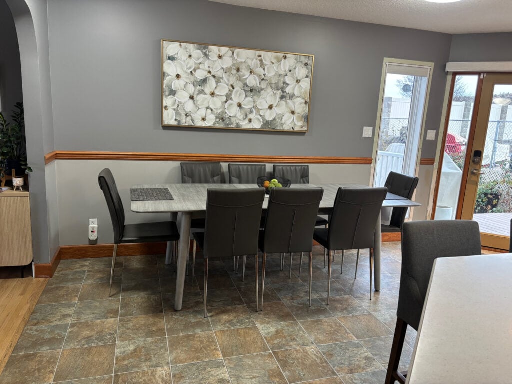 BEFORE UPDATE, DINING ROOM LINOLEUM FLOORING, WOOD TRIM AND CHAIR RAIL