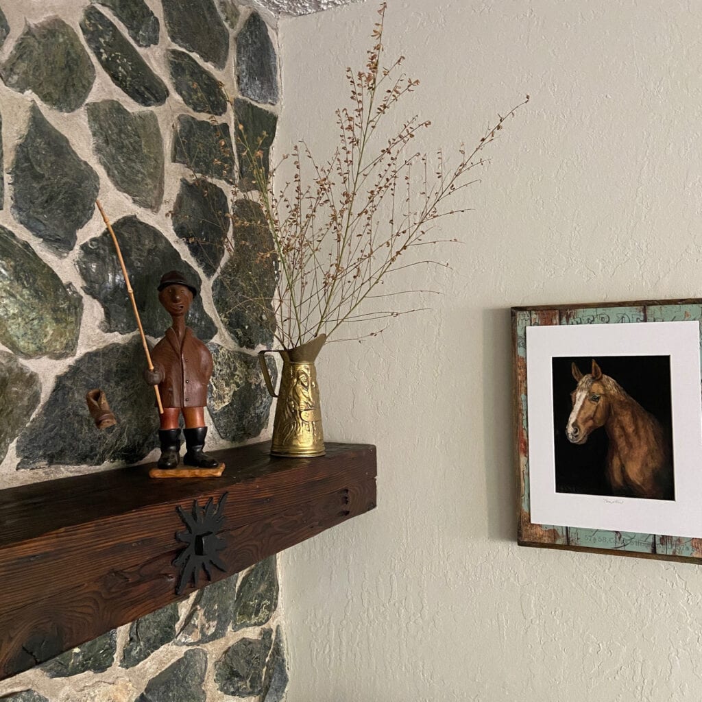 Benjamin Moore Edgecomb Gray 50% lighter with gray and green real stone rustic fireplace with dark wood mantel