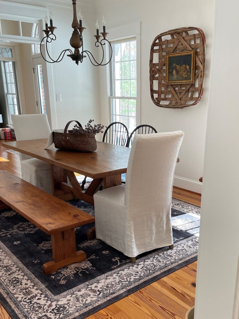 Benjamin Moore White Dove modern farmhouse dining room, rustic wood table and home decor