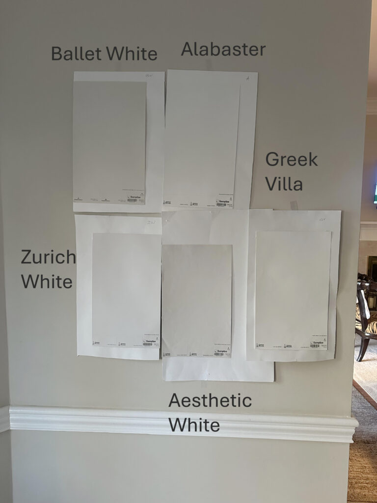 Sherwin Williams Shoji White, Aesthetic White, Greek Villa, Zurich White, Benjamin Moore Ballet White, samplize peel and stick samples on wall with north light
