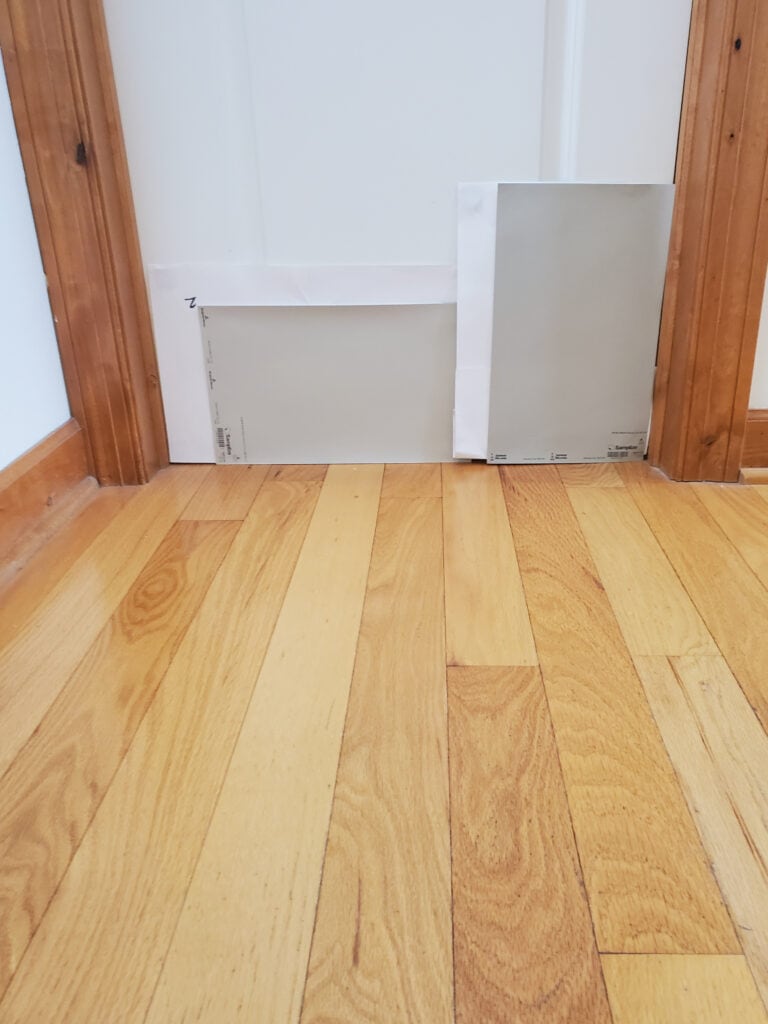 White oak or hemlock floor with yellow-orange stain, Sherwin Williams Amazing Gray, Benjamin Moore Revere Pewter