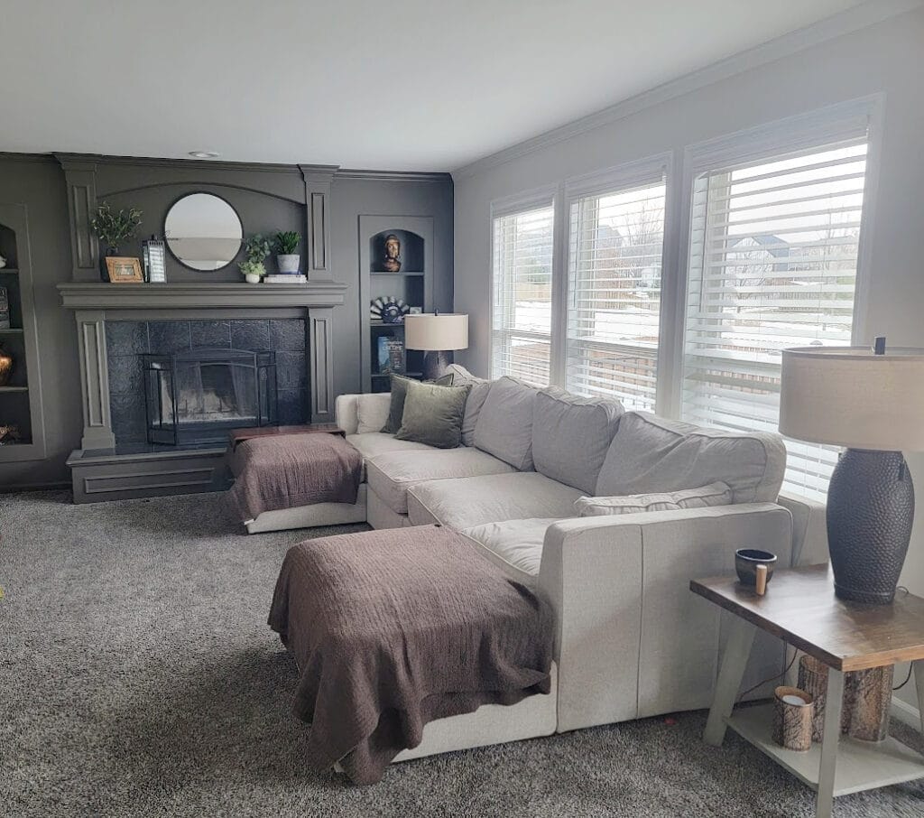 familyroom or living room, fireplace with flush built-in shelves, moldings, all painted the same color Sherwin Williams Urbane Bronze with Egret White walls