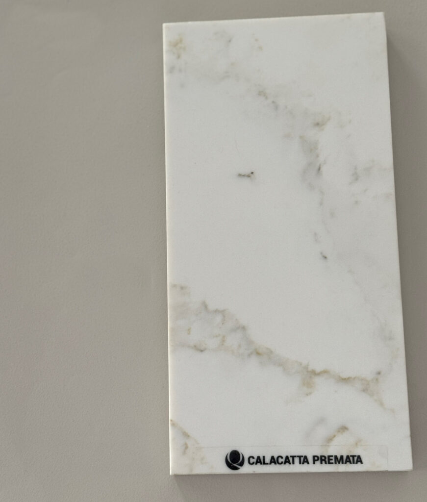 white quartz with warm gold veins and gray, MSI Calacatta Premata