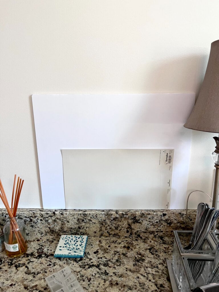 Off-white warm beige-taupe from Benjamin Moore Aura, granite countertop similar to Santa Cecilia