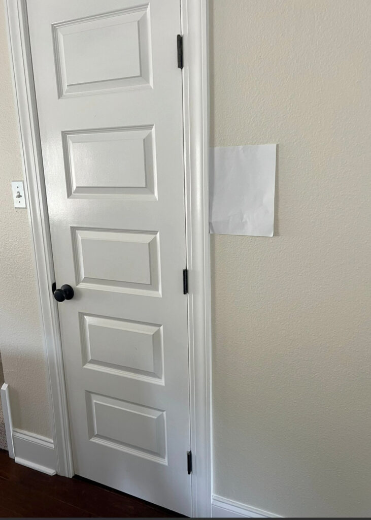Sherwin Williams Casa Blanca with warm white trim, soft cream paint color