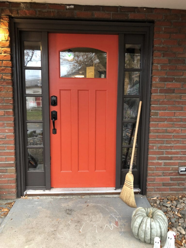 Sherwin Williams Hearty Orange, orange-red paint color for exterior of front door with red brick and dark brown trim like Benjamin Moore Willow